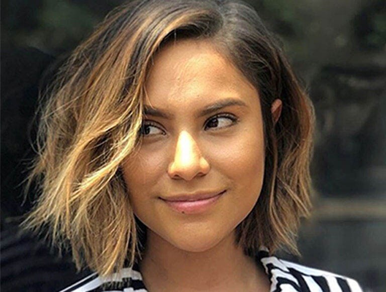 UGC image from Instagram, @avedaartists - balayage deep side part bob haircut.